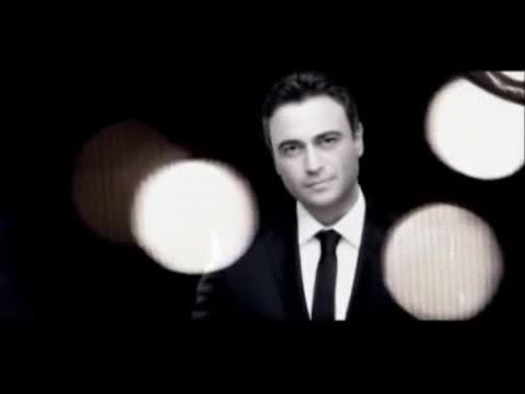 Kutsi - Bambaşka Mp3 İndir