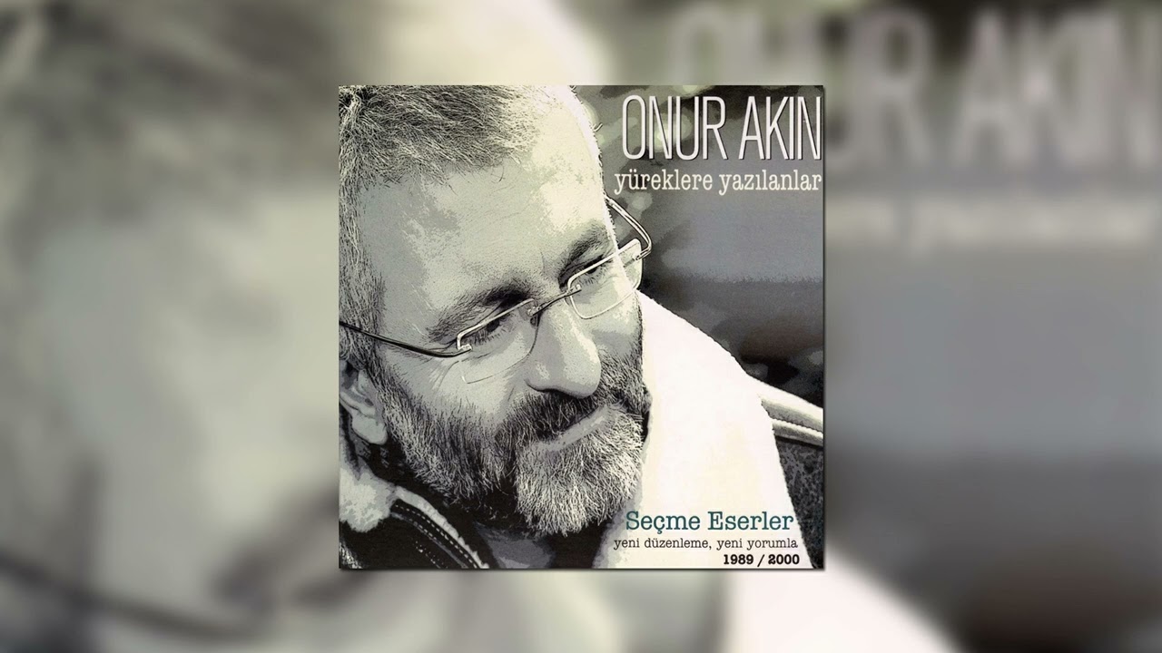 Onur Akın - Yağmur Yüreklim Mp3 İndir
