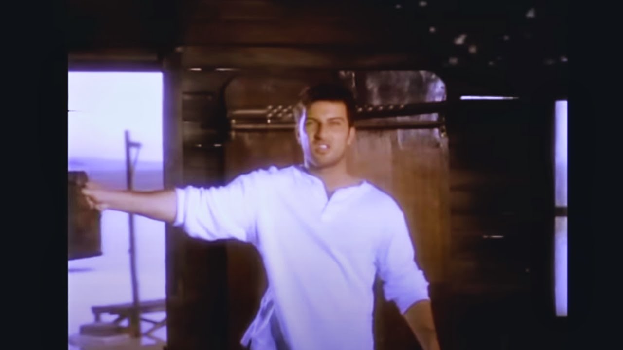 TARKAN - İkimizin Yerine (Official Music Video) Mp3 İndir